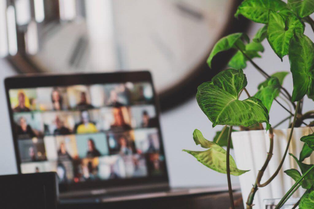Picture shows a laptop with a collaborative video call.