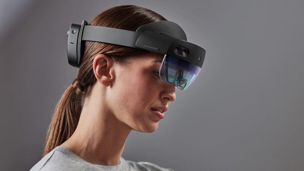 Photo of a woman wearing the Microsoft Hololens 2.