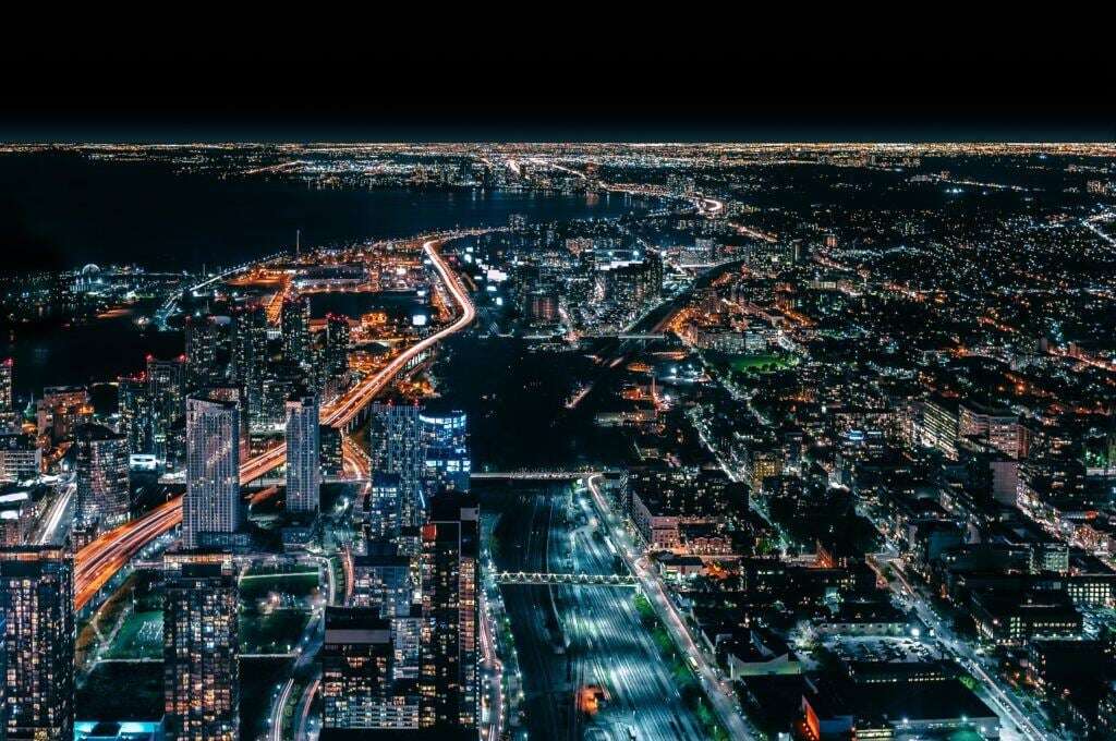 Image of a cityscape lit up at night