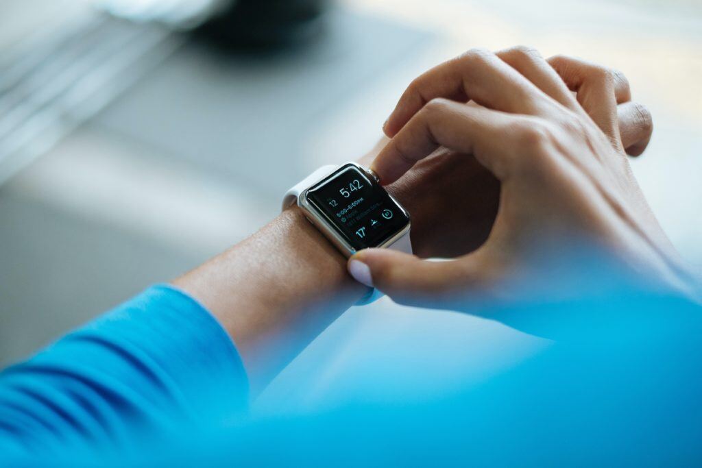 Image of a person using a fitness watch
