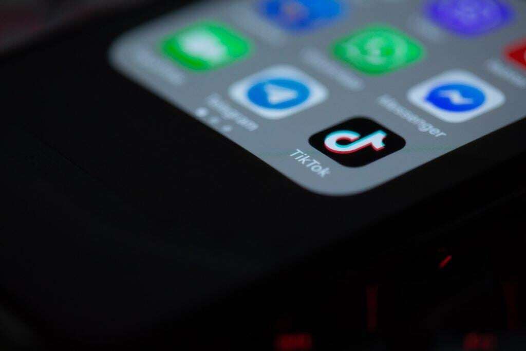 Image shows a phone screen with the TIkTok app.